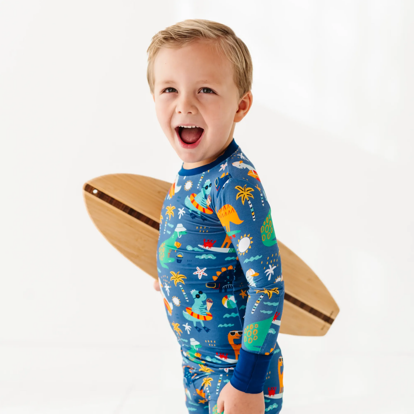 Blue dinosaur bamboo pajamas by Kiki and Lulu