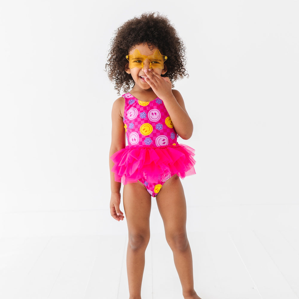 
                      
                        Electric Smiles Swimsuit With Tutu
                      
                    
