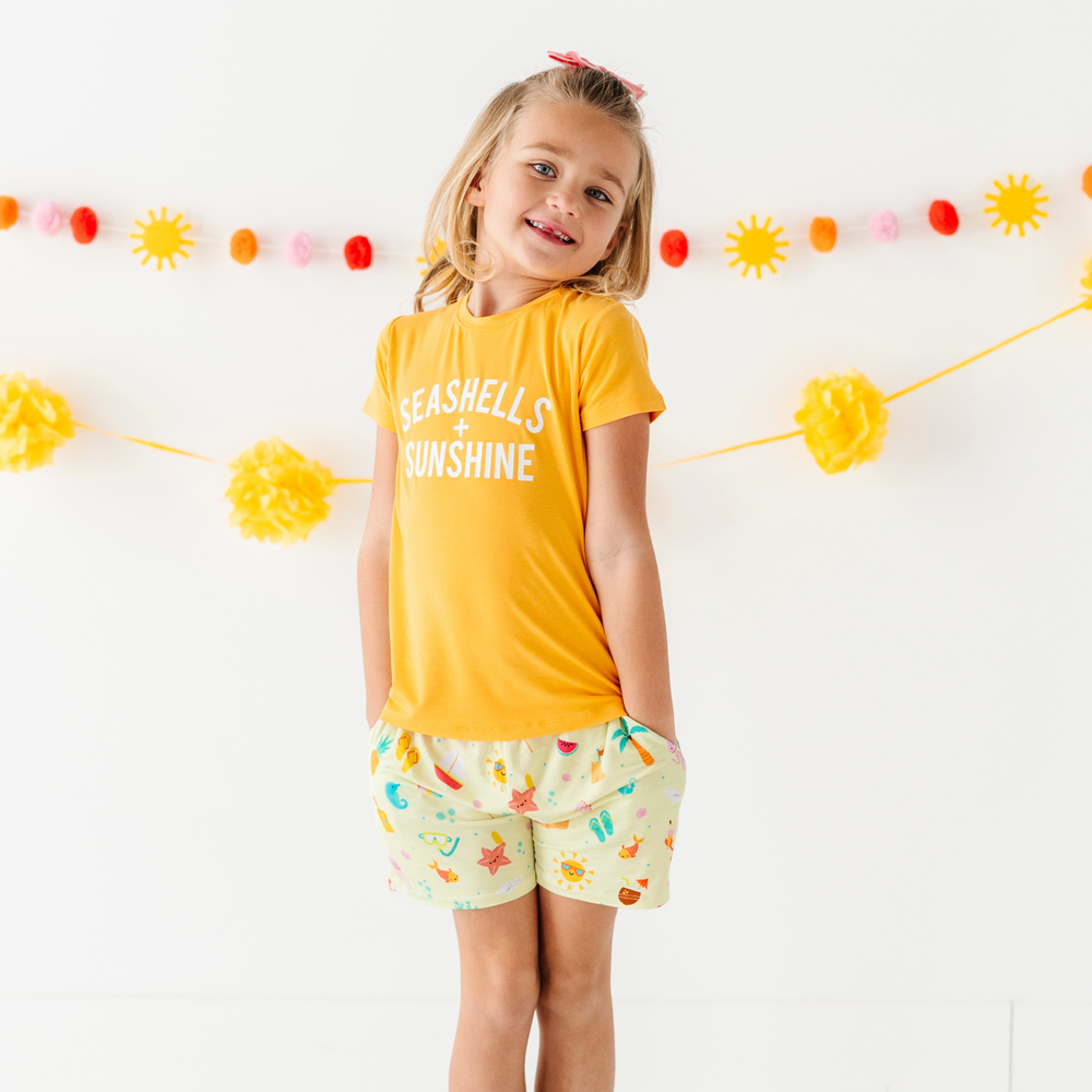 
                      
                        Girl in beach daywear
                      
                    