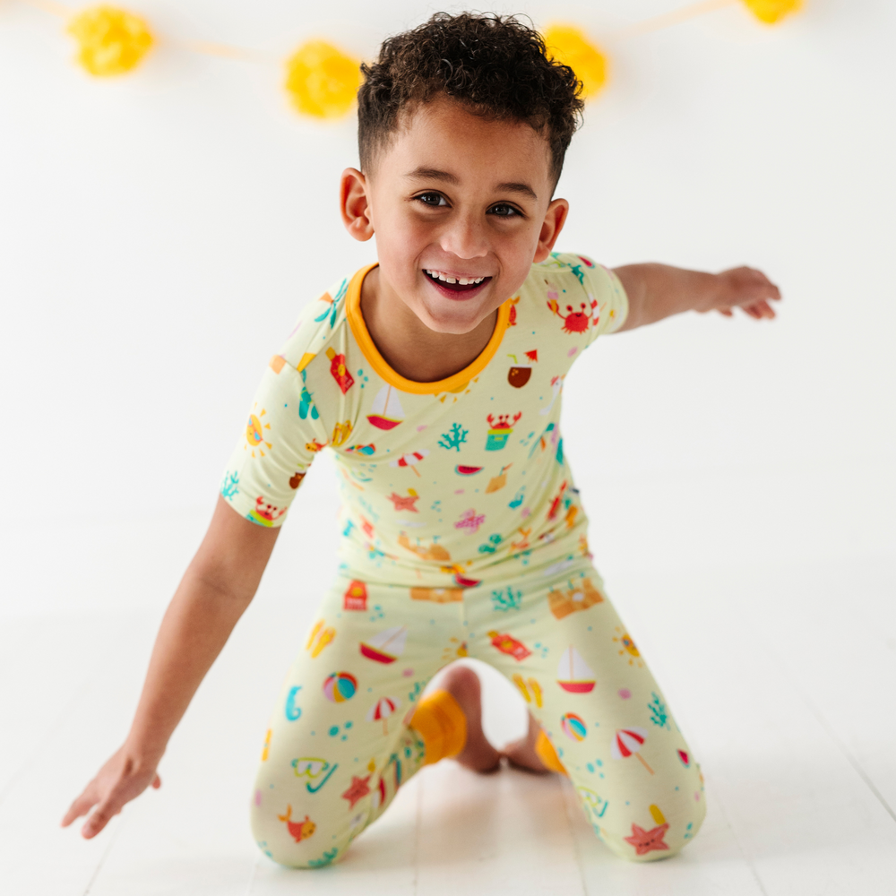 
                      
                        Kid in Beach Pajamas By Kiki Lulu i
                      
                    