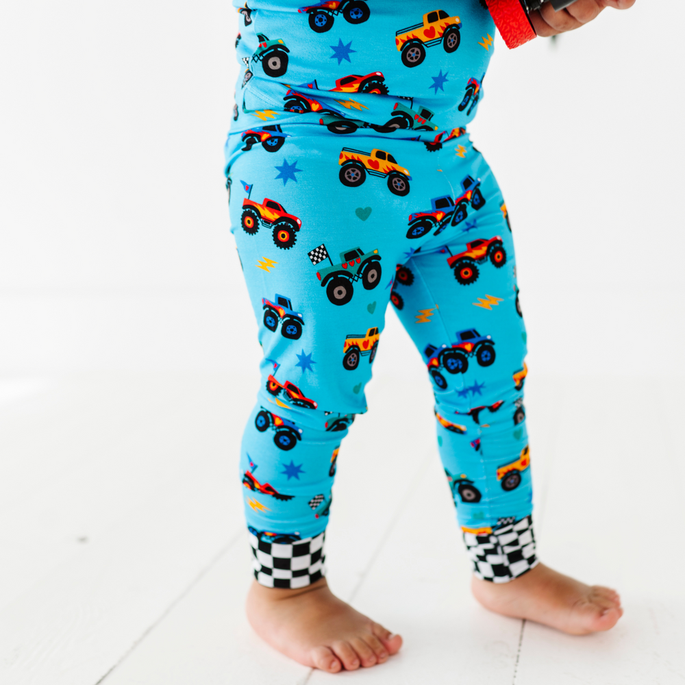 
                      
                        Boy in monster truck pajamas by Kiki and Lulu
                      
                    