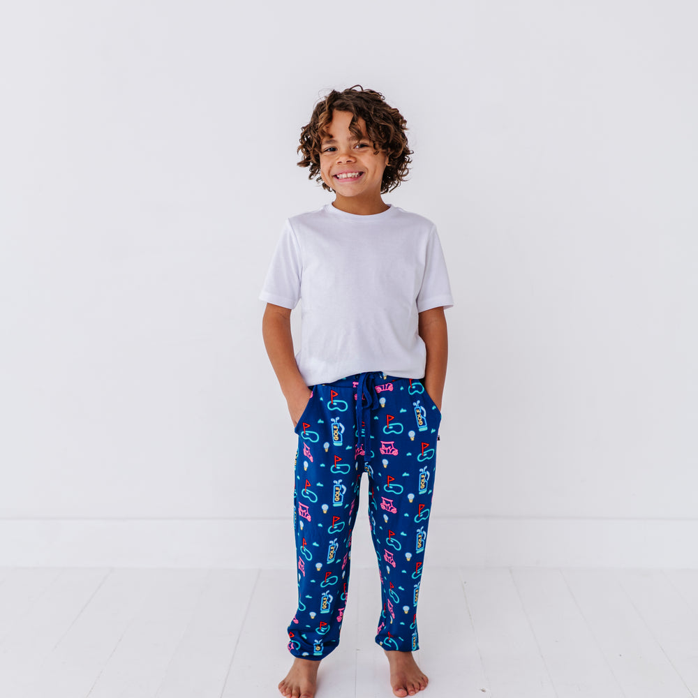 
                      
                        Boy Wearing Neon Golf Pajamas By Kiki Lulu
                      
                    