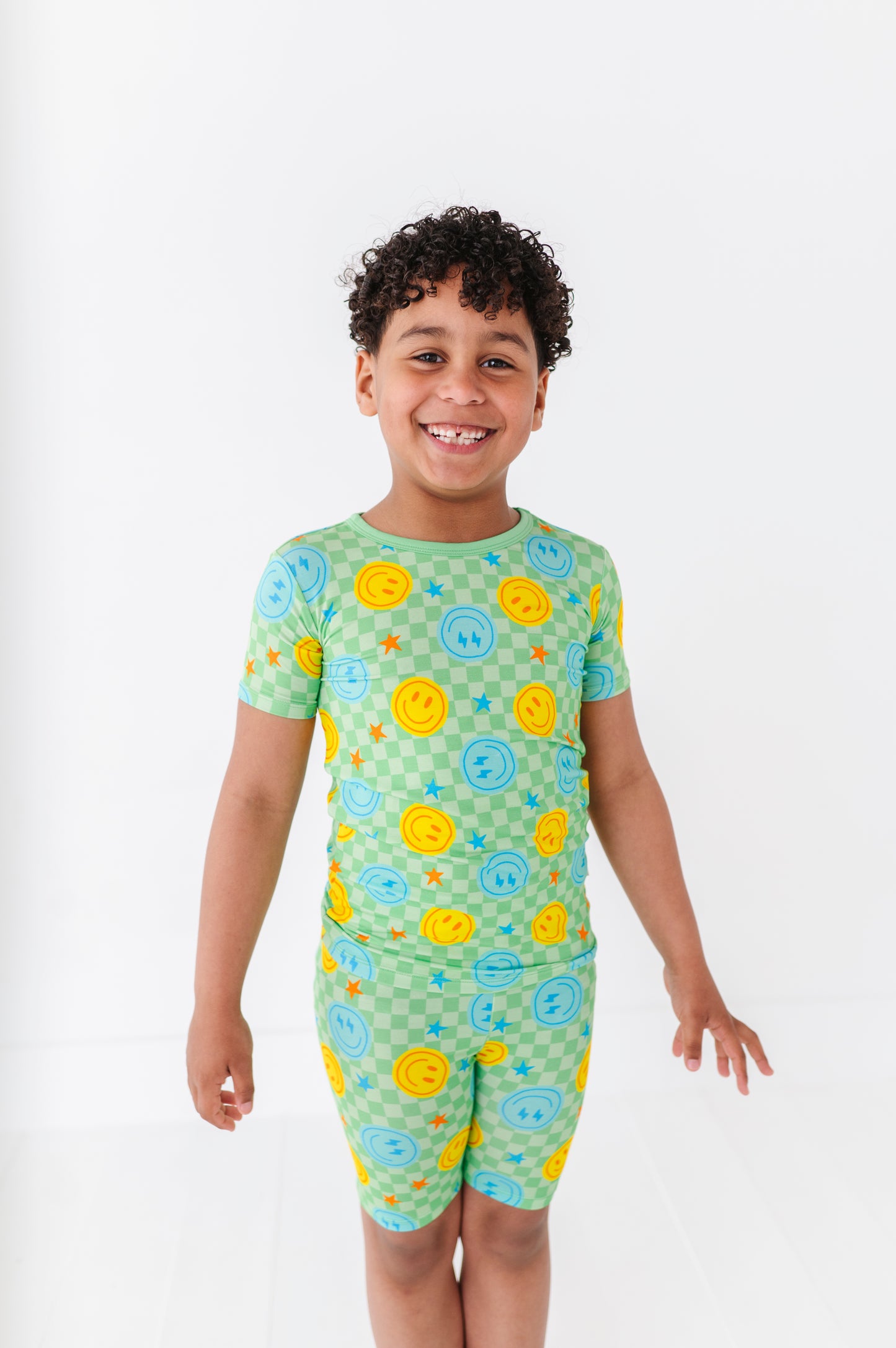 Boy Wearing Short Smiley Pajamas By Kiki and Lulu