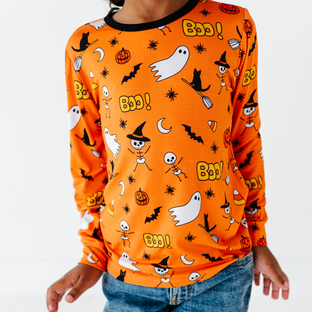 
                      
                         Boy wearing longsleeve Halloween shirt by Kiki and Lulu
                      
                    