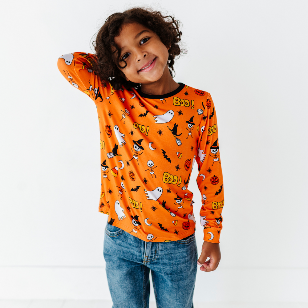 
                      
                         Boy wearing longsleeve Halloween shirt by Kiki and Lulu
                      
                    