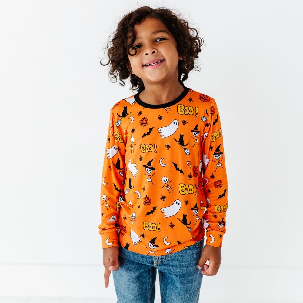 
                      
                         Boy wearing longsleeve Halloween shirt by Kiki and Lulu
                      
                    