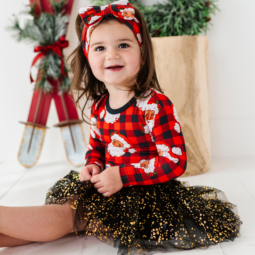 
                      
                        Girl in Christmas dress with tulle by Kiki and Lulu
                      
                    