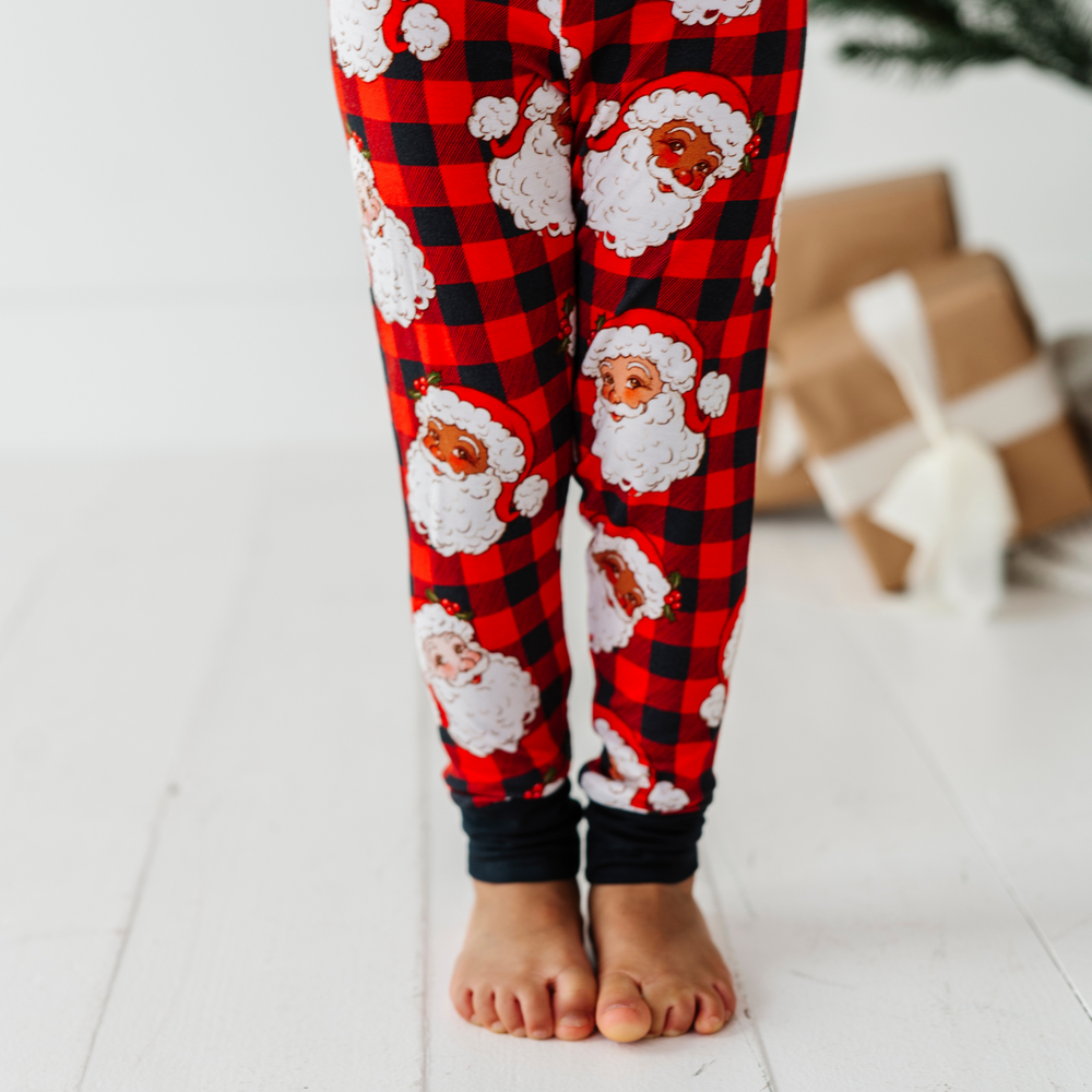 
                      
                        Girl in Buffalo Plaid Santa pajamas by kiki and lulu
                      
                    