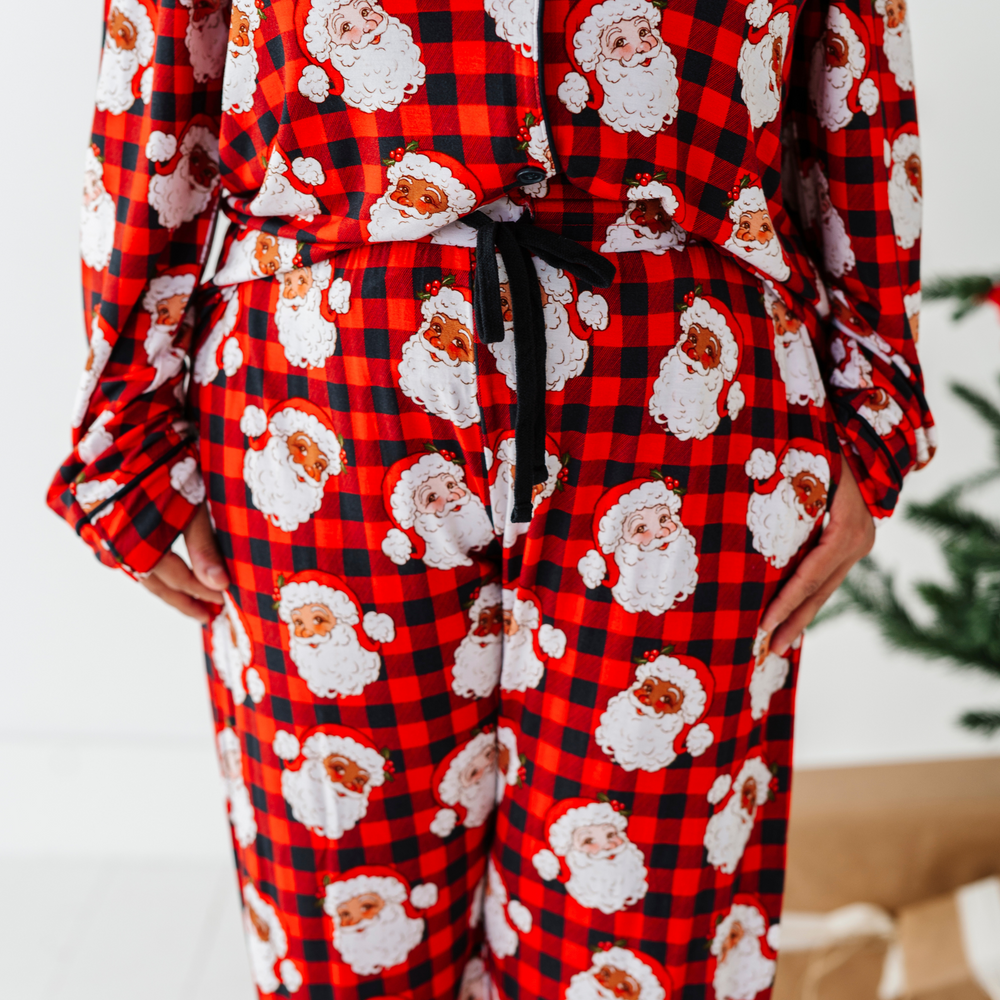 
                      
                        Woman wearing buffalo check santa pajamas by Kiki and Lulu
                      
                    