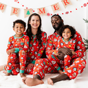 
                
                    Load image into Gallery viewer, woman in family matching christmas pajamas
                
            