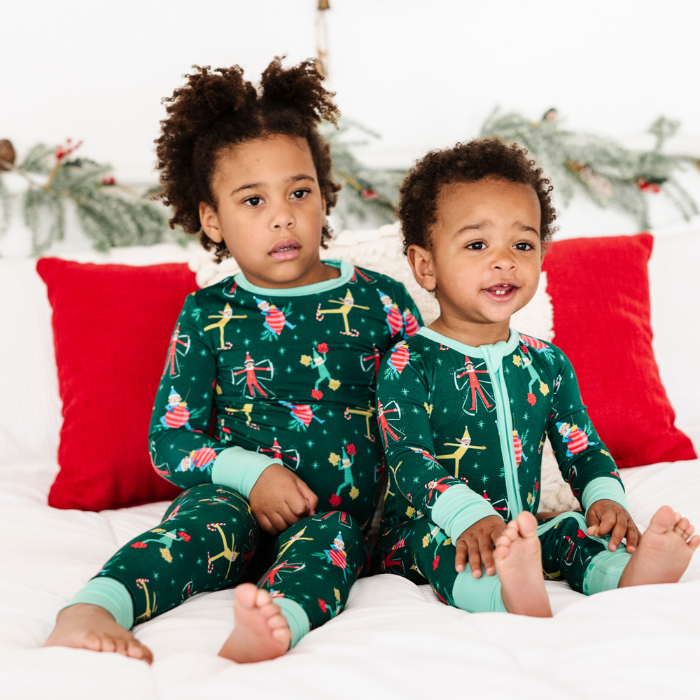
                
                    Load image into Gallery viewer, Toddler in elf on the shelf pajamas by Kiki and Lulu
                
            