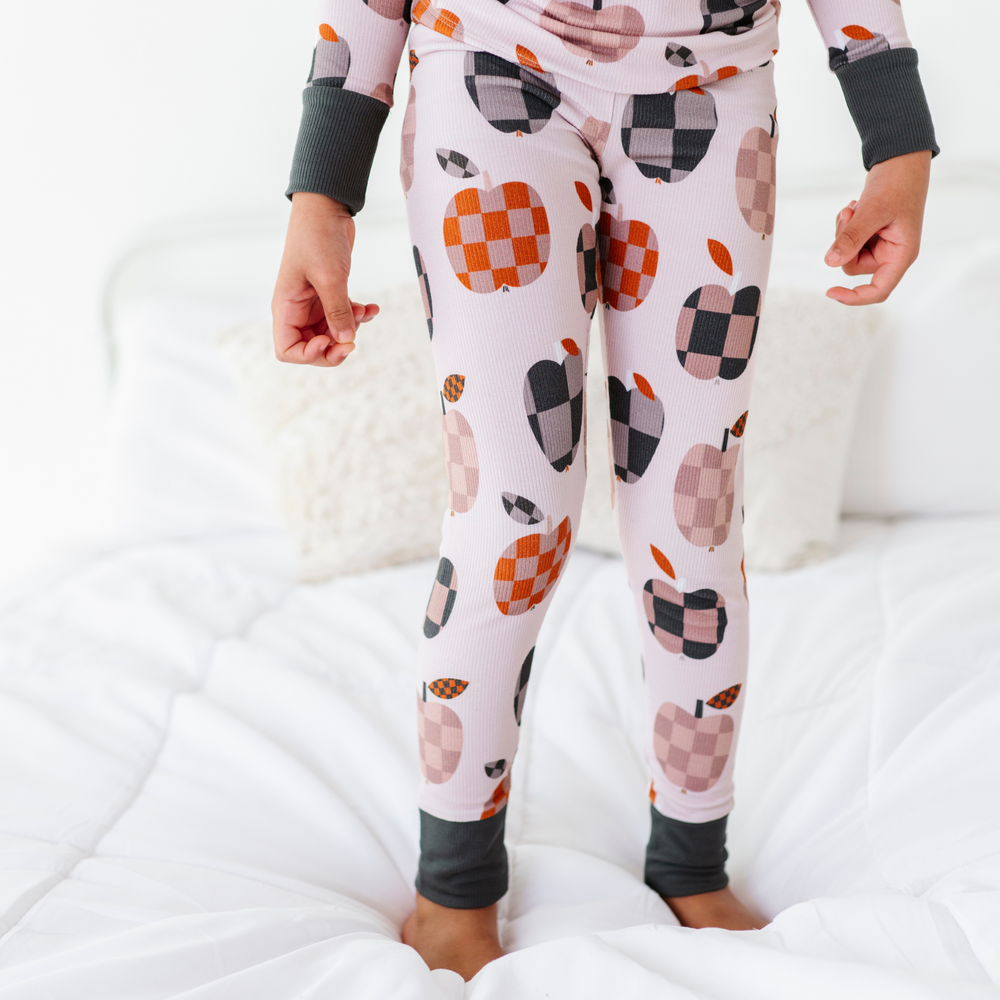 
                      
                        Girl Wearing Fall Apple Kids Pajamas
                      
                    