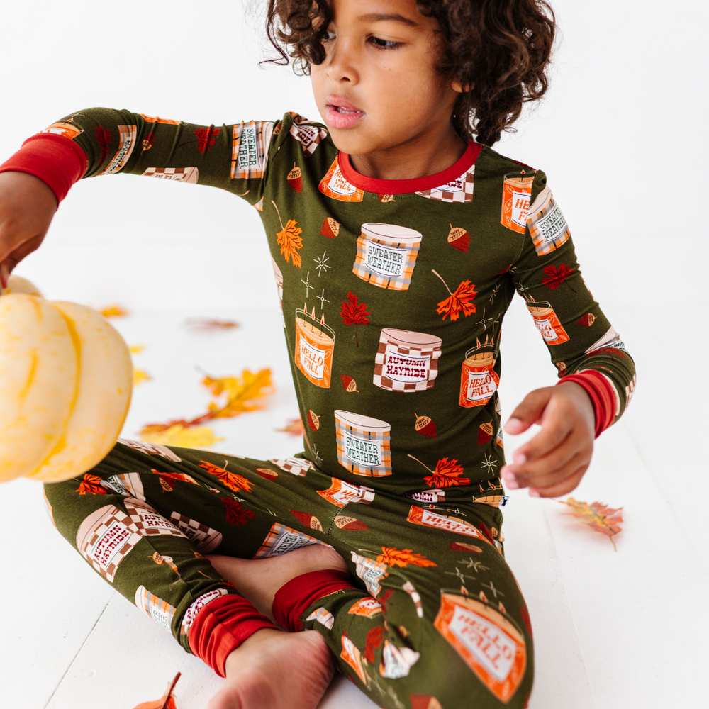 
                      
                        Kid Wearing Fall Candle Pajamas By Kiki and Lulu
                      
                    