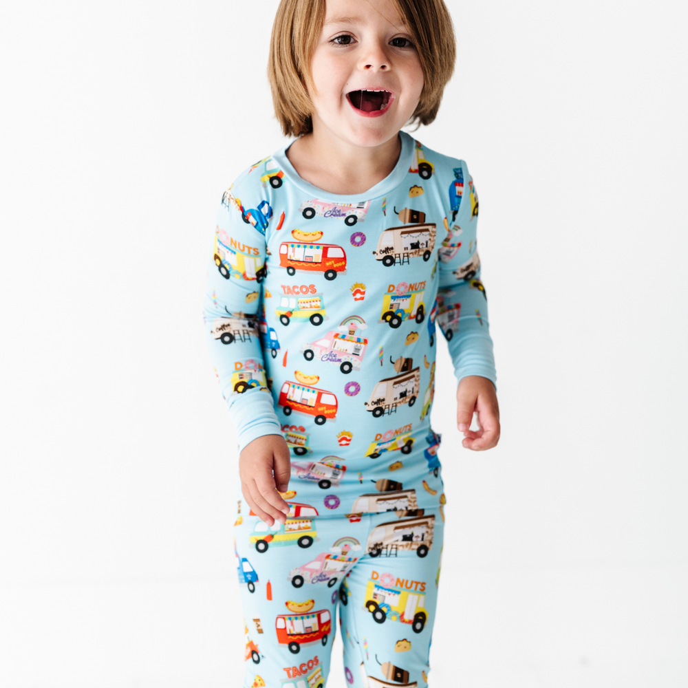 Kid in Kiki+Lulu Food Truck Pajamas