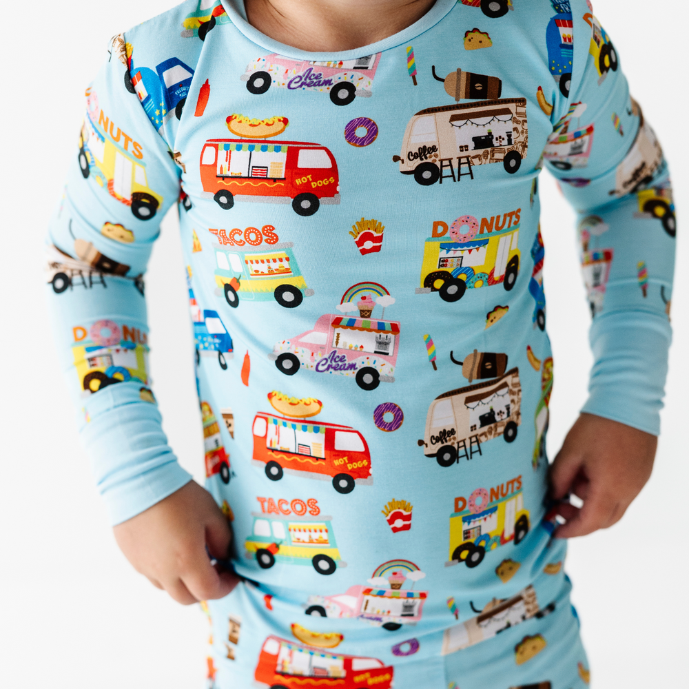 
                      
                        Kid in Kiki+Lulu Food Truck Pajamas
                      
                    