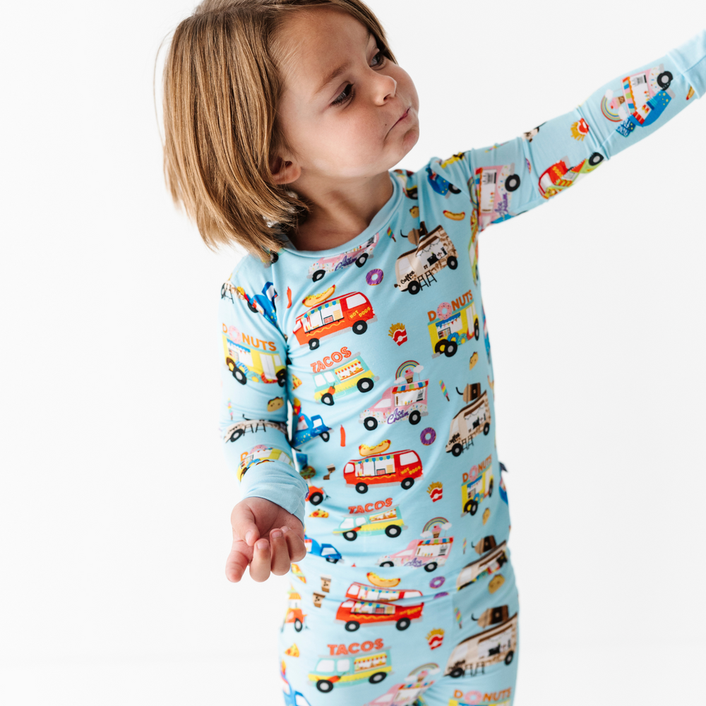 
                      
                        Kid in Kiki+Lulu Food Truck Pajamas
                      
                    