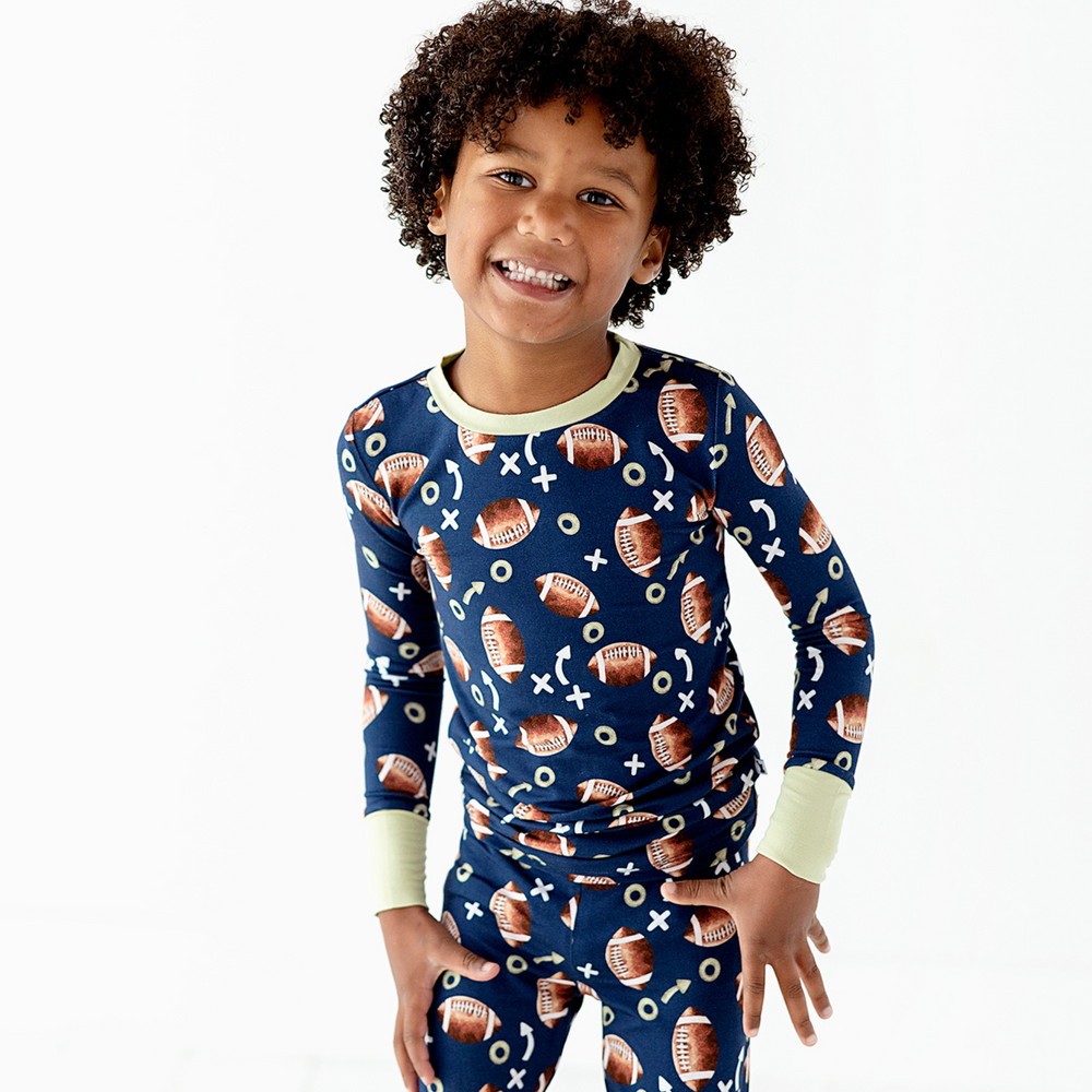 
                
                    Load image into Gallery viewer, Clear Eyes, Full Hearts, Lets Snooze Football Toddler/Big Kid Pajamas
                
            