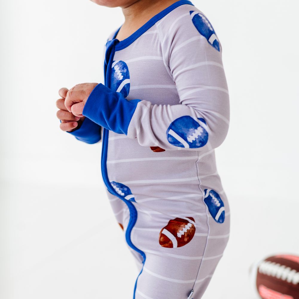 Boy in Football Convertible Footies by Kiki and Lulu