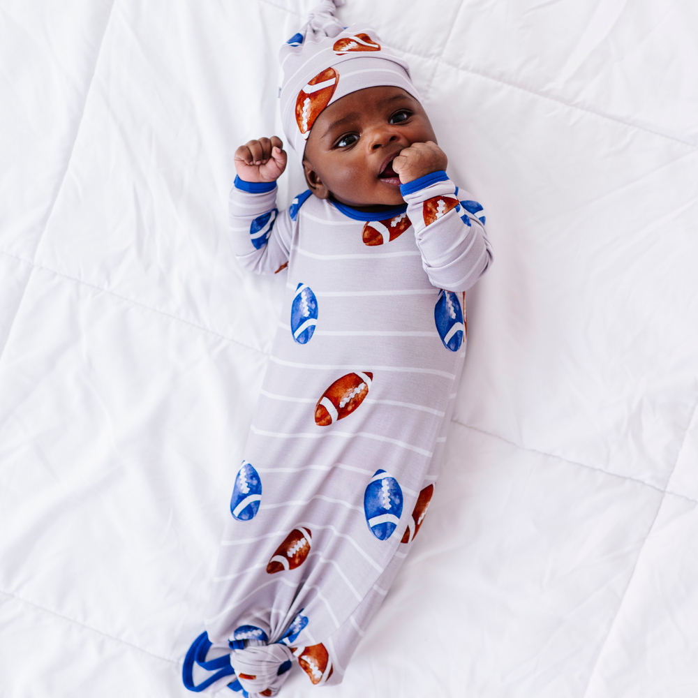 
                      
                        Knotted Football Gown For Newborn
                      
                    