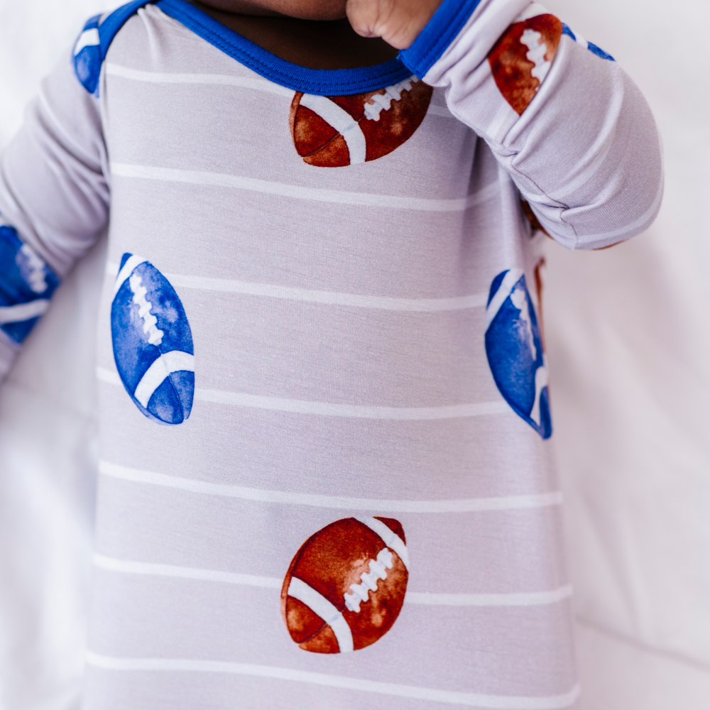 
                      
                        Knotted Football Gown For Newborn
                      
                    