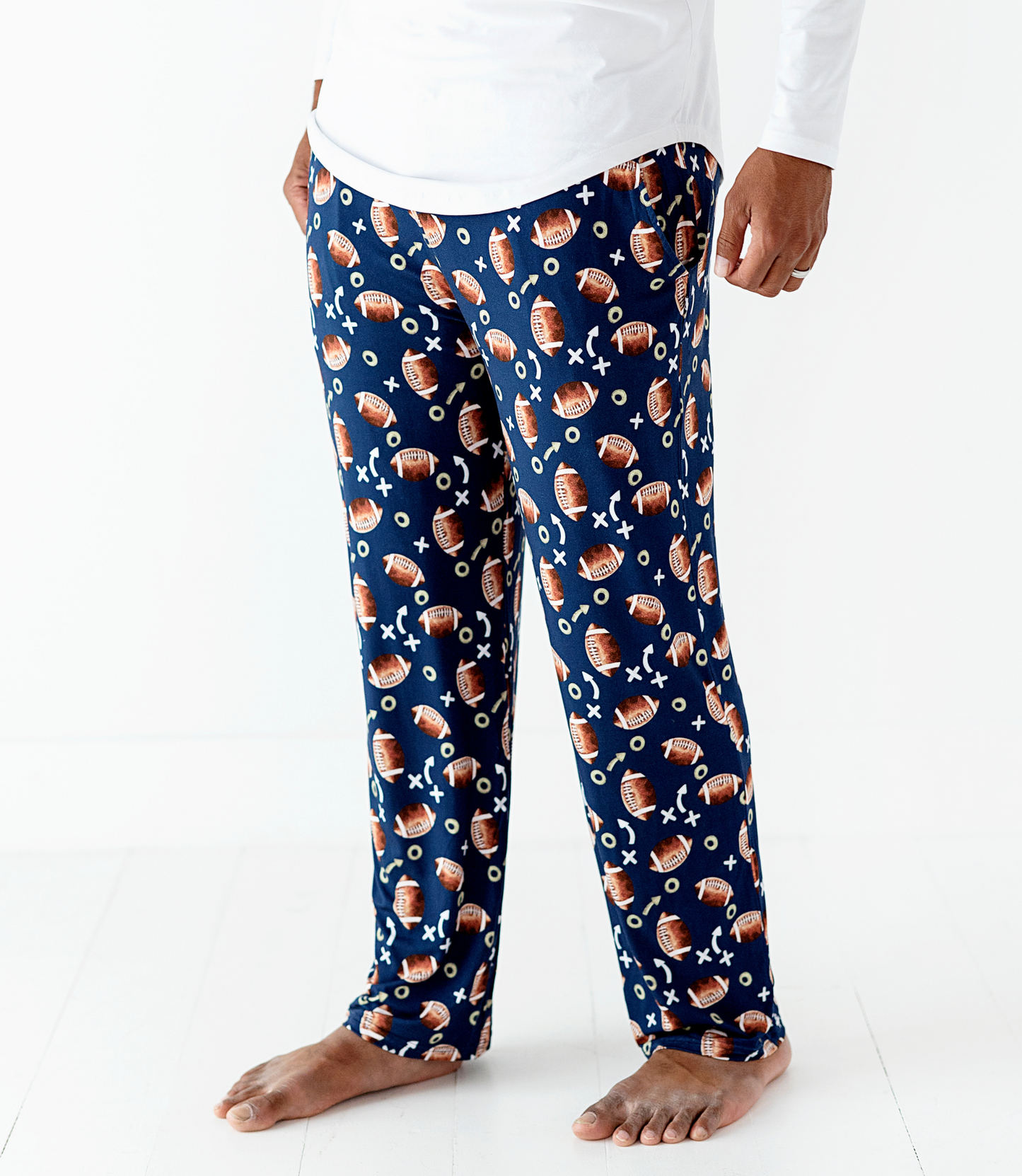 man in football lounge pants