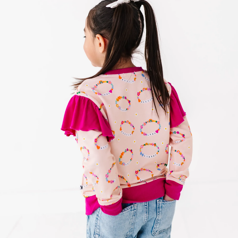 
                      
                        Friendship bracelet sweatshirt by Kiki and Lulu
                      
                    