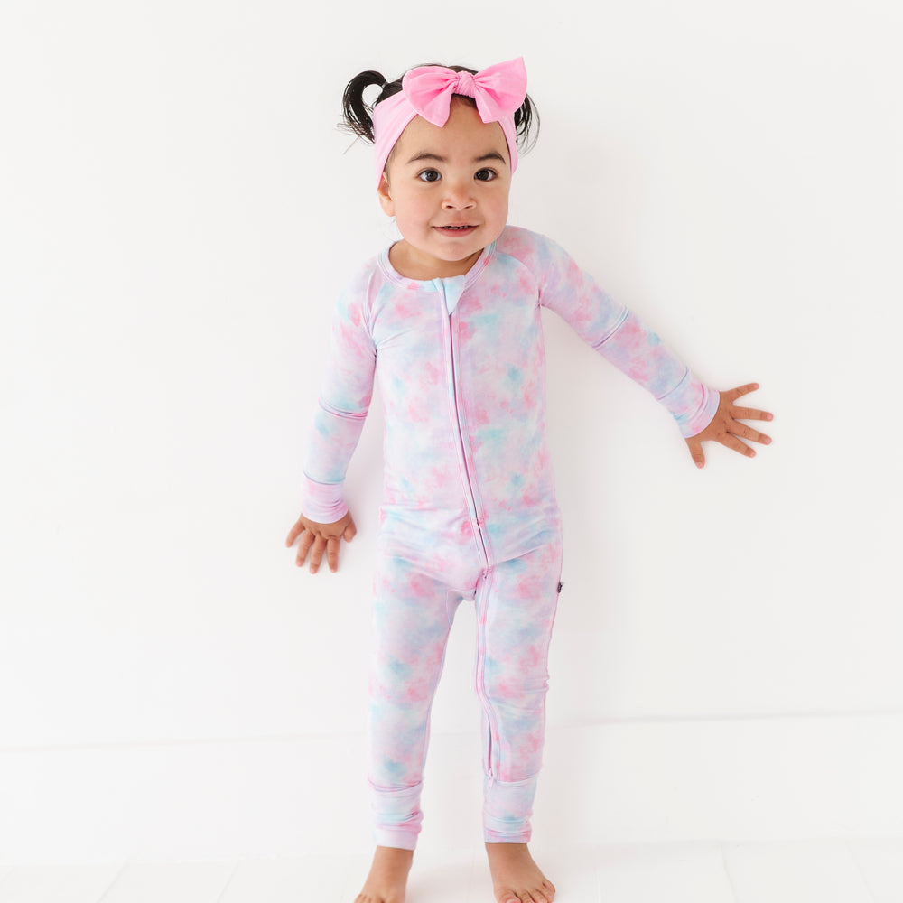 
                      
                        Girl in tie dye convertible footies by Kiki and Lulu
                      
                    