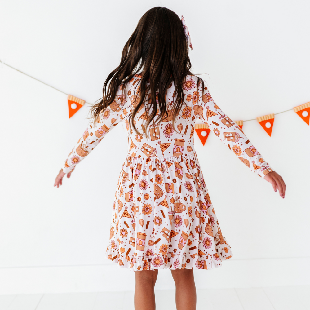 
                      
                        Girl in Pumpkin Spice Latte Dress by Kiki and Lulu
                      
                    