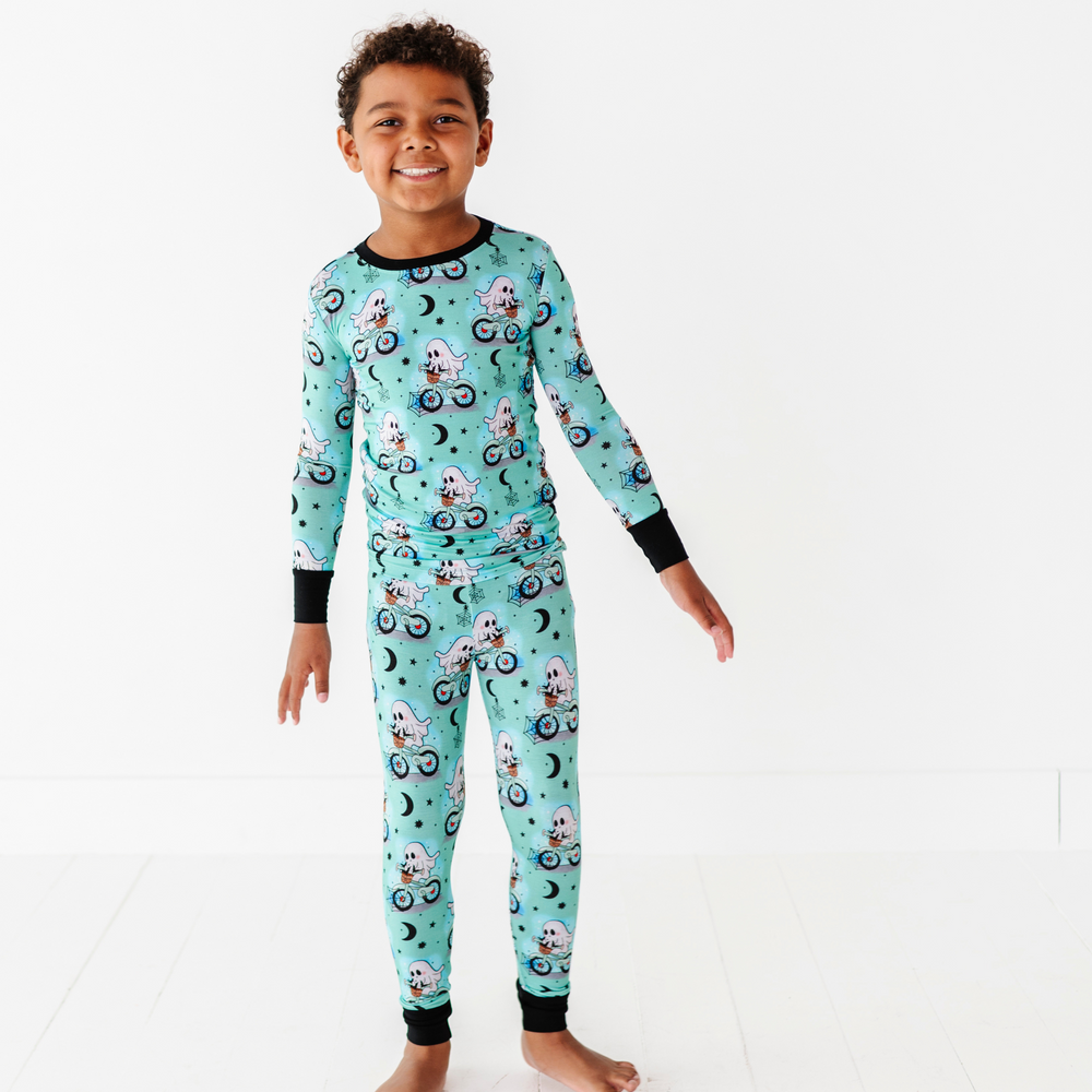 
                      
                        Boy wearing motorcycle ghost pajamas by Kiki and Lulu
                      
                    