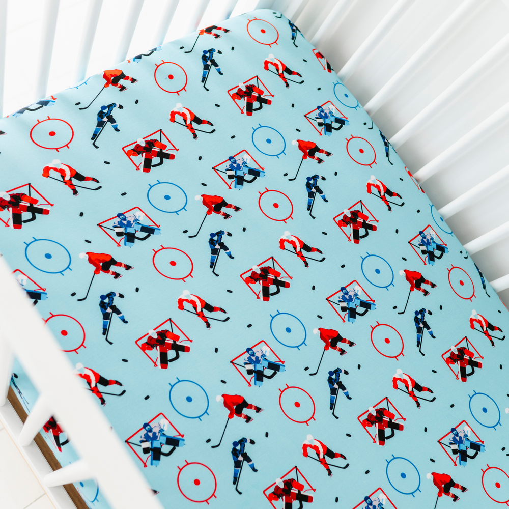 
                      
                        Hockey crib sheet by Kiki and Lulu
                      
                    