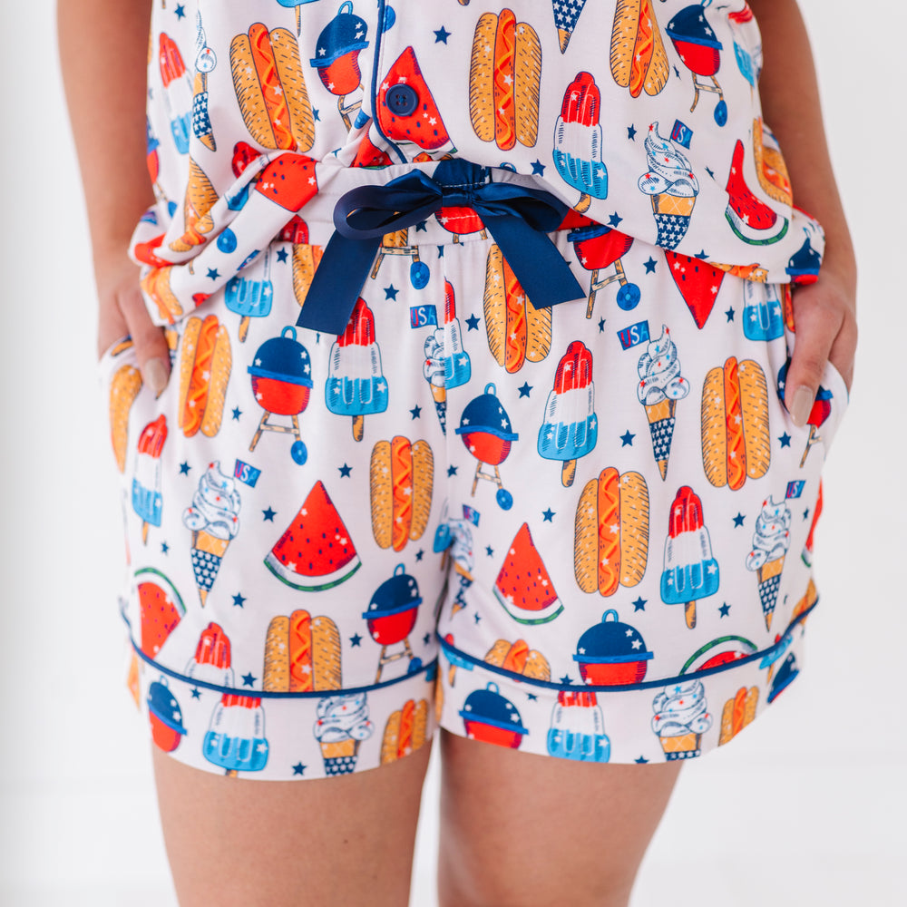 
                      
                        Mom wearing 4th of July hot dog pajamas made from soft bamboo fabric, perfect for matching family sets
                      
                    
