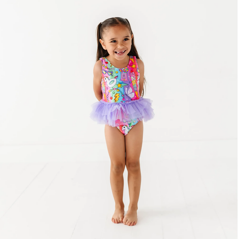 
                      
                        Cosmic Candyland Swimsuit With Tutu
                      
                    