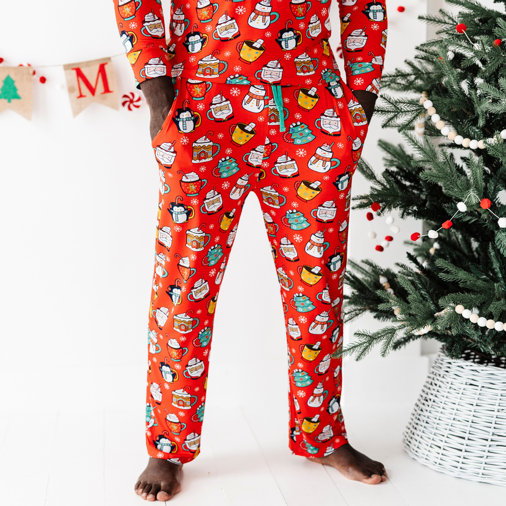 
                      
                        Man in family matching Christmas cocoa pajamas
                      
                    