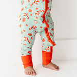 Baby in Mint footies by Kiki and Lulu