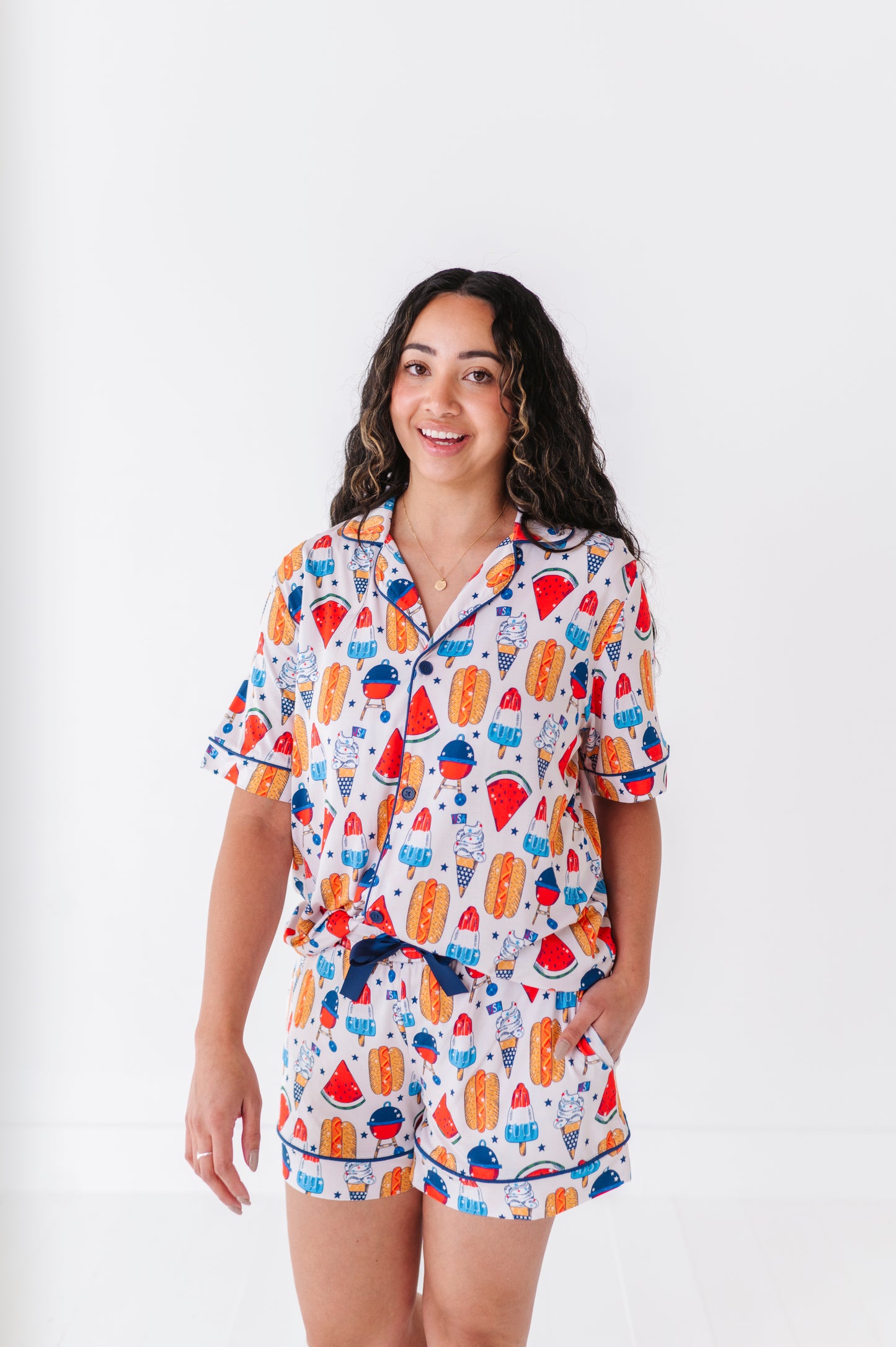 Mom wearing 4th of July hot dog pajamas made from soft bamboo fabric, perfect for matching family sets