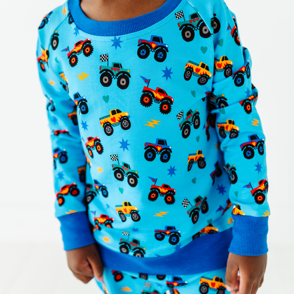 
                      
                        Kid wearing monster truck jogger set by Kiki and Lulu
                      
                    