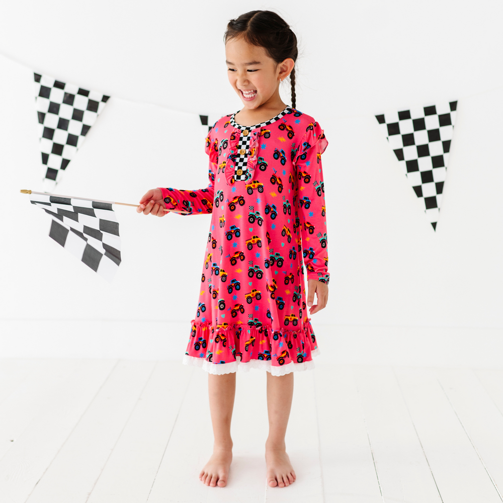 
                      
                        Girl in Monster Truck nightgown by Kiki and Lulu
                      
                    