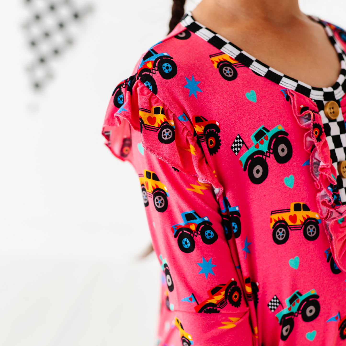 Girl in Monster Truck nightgown by Kiki and Lulu