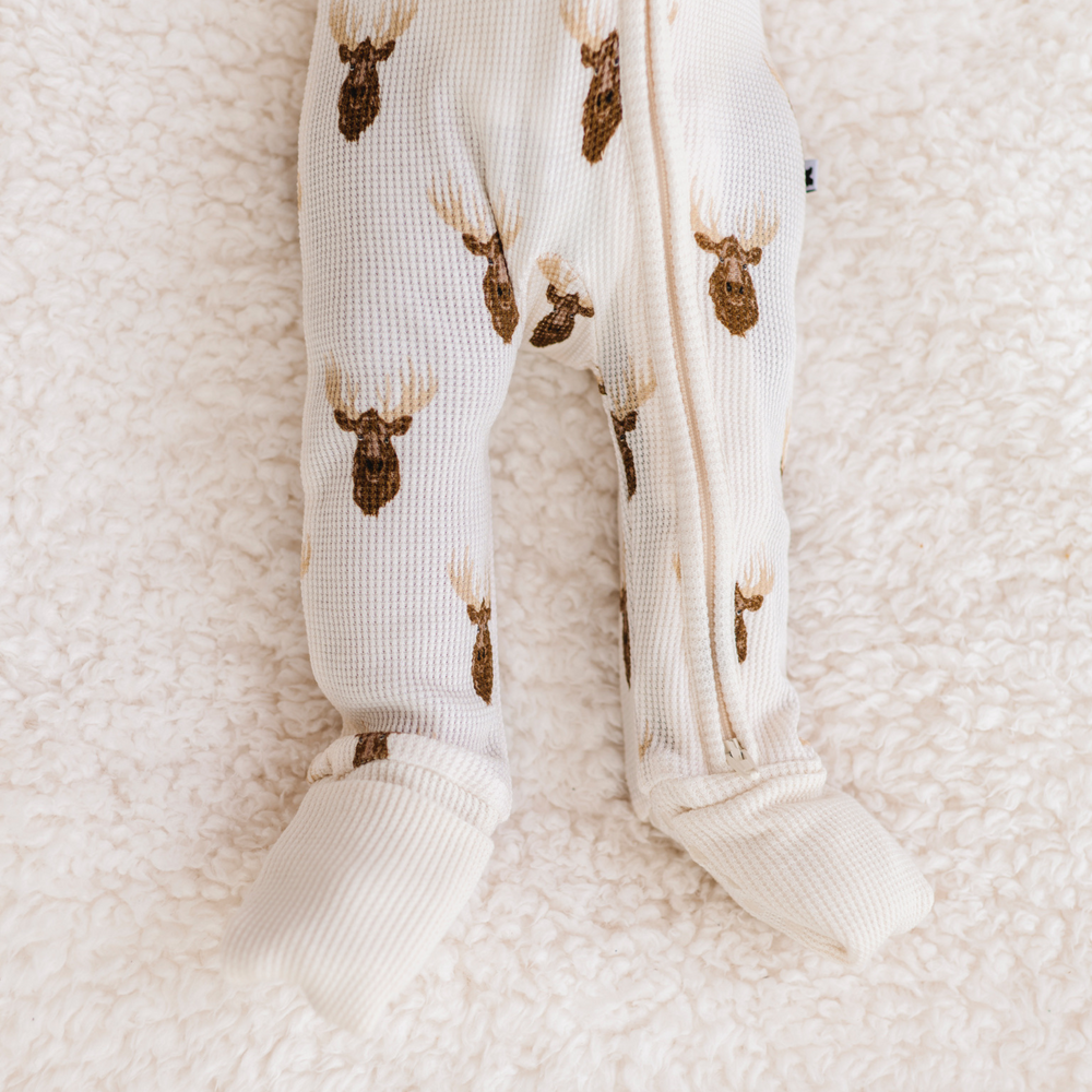 
                      
                        Waffle knit baby pajamas with moose by Kiki and Lulu
                      
                    