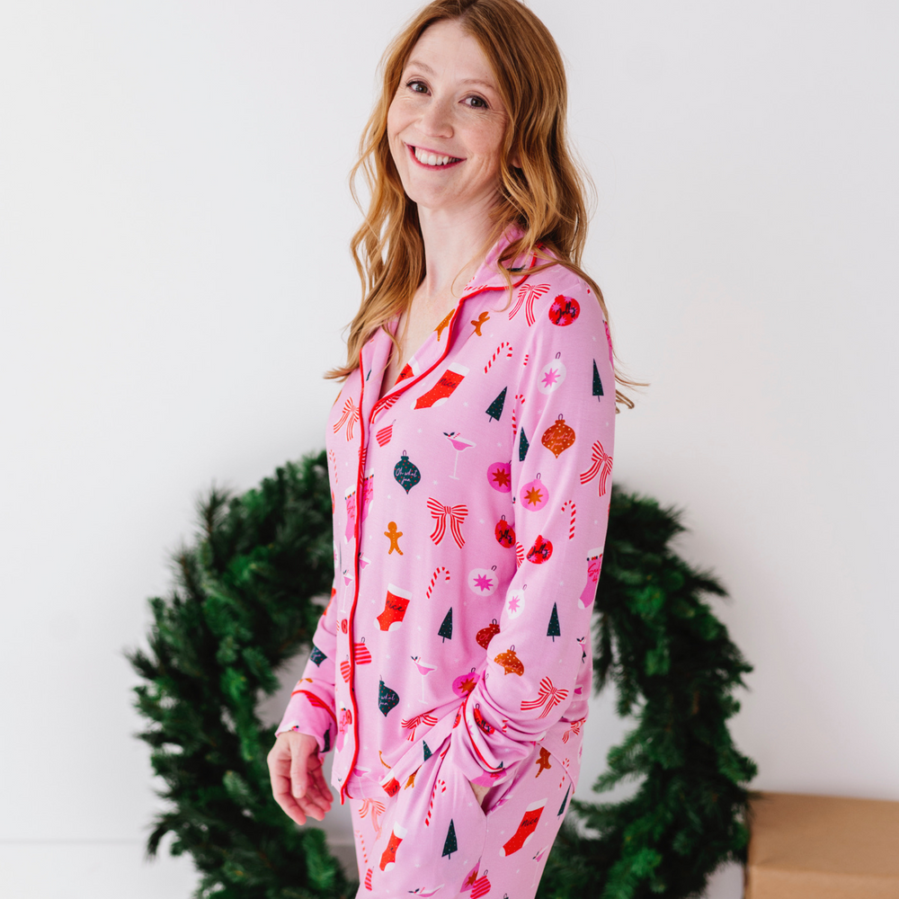 
                      
                        Woman in pink Christmas pajamas by Kiki and Lulu
                      
                    