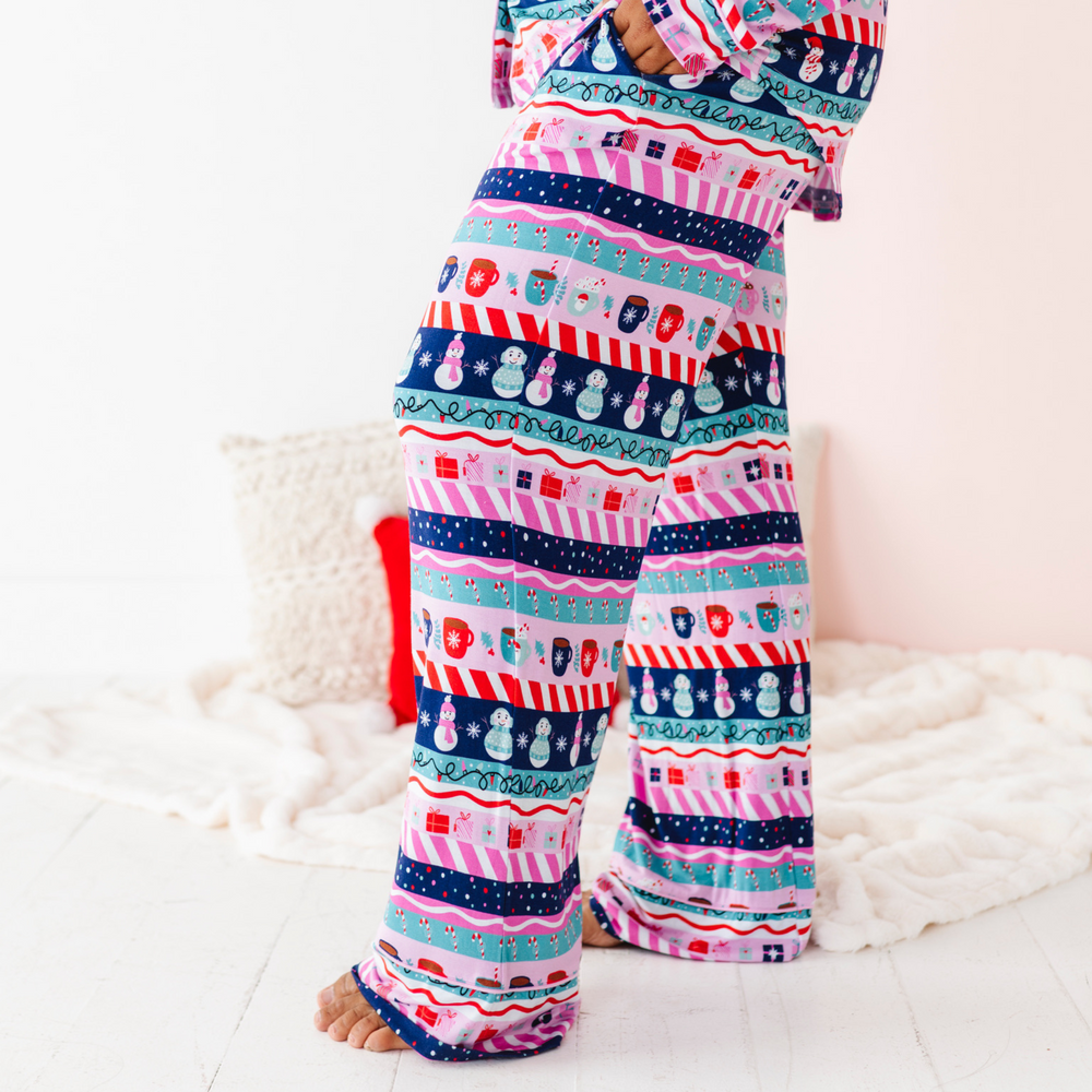 
                      
                        Woman in Pink Fair Isle Pajamas by Kiki and Lulu
                      
                    