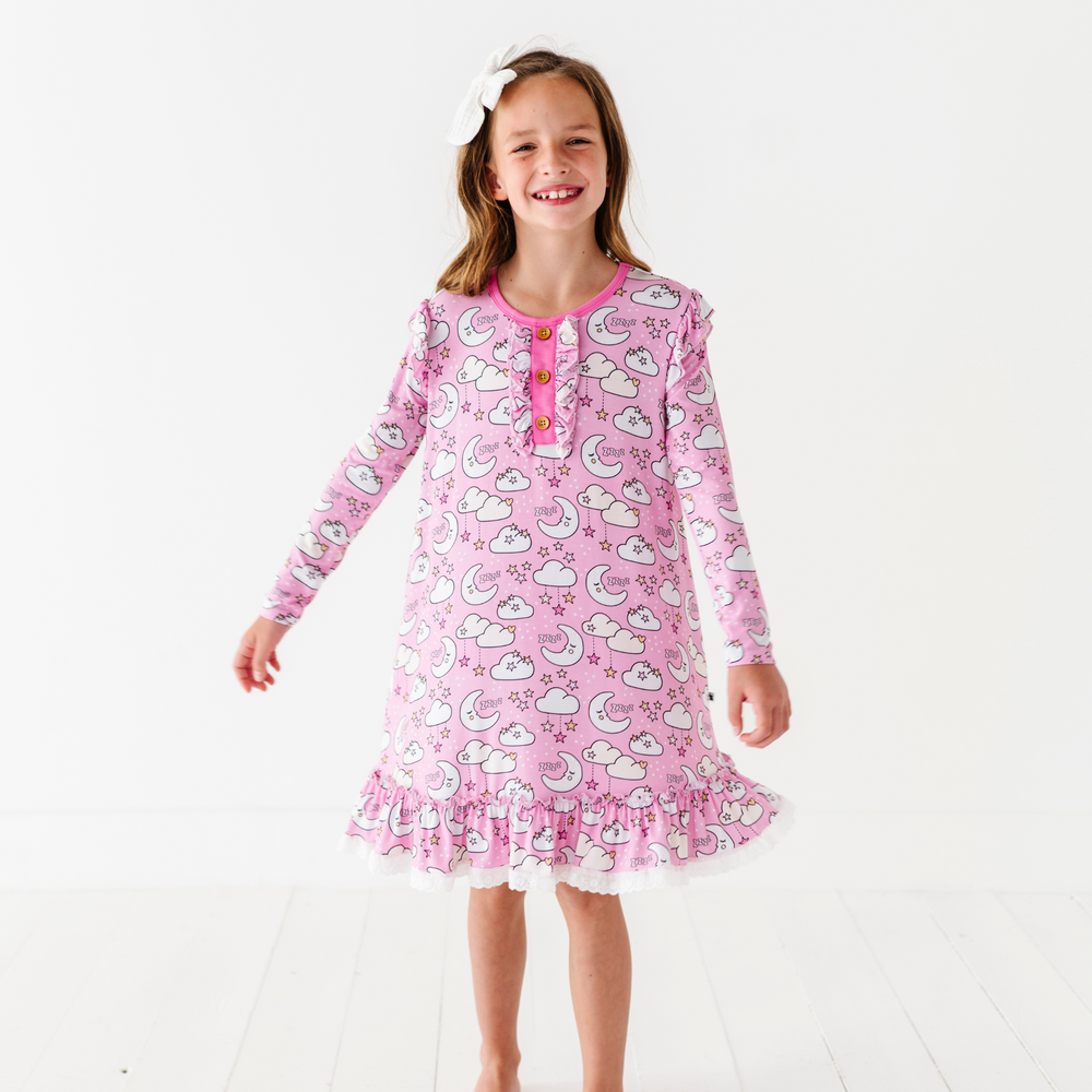 
                      
                        Girl in pink moon nightgown by Kiki and Lulu
                      
                    