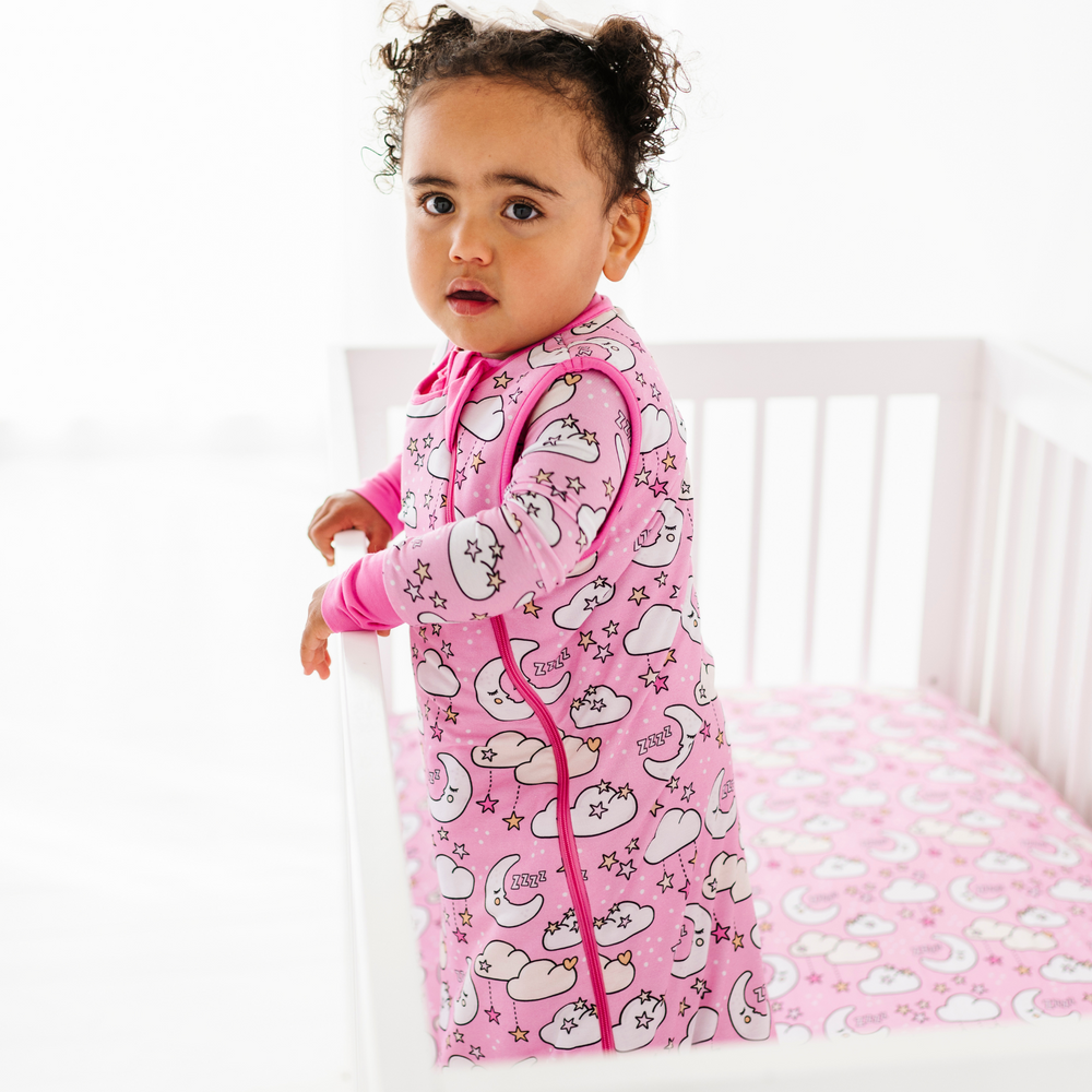 
                      
                        Baby in pink sleep bag by Kiki and Lulu
                      
                    