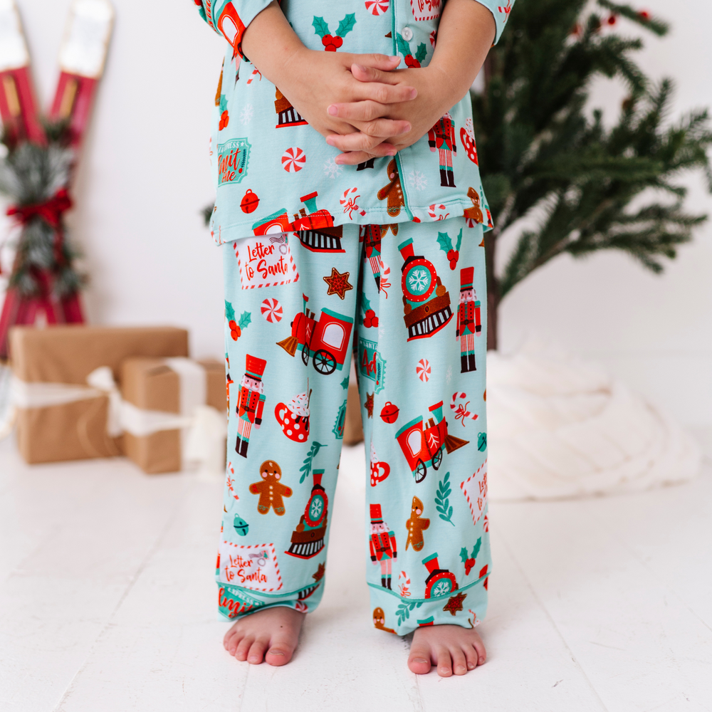 
                      
                        Girl in Christmas Train Pajamas
                      
                    