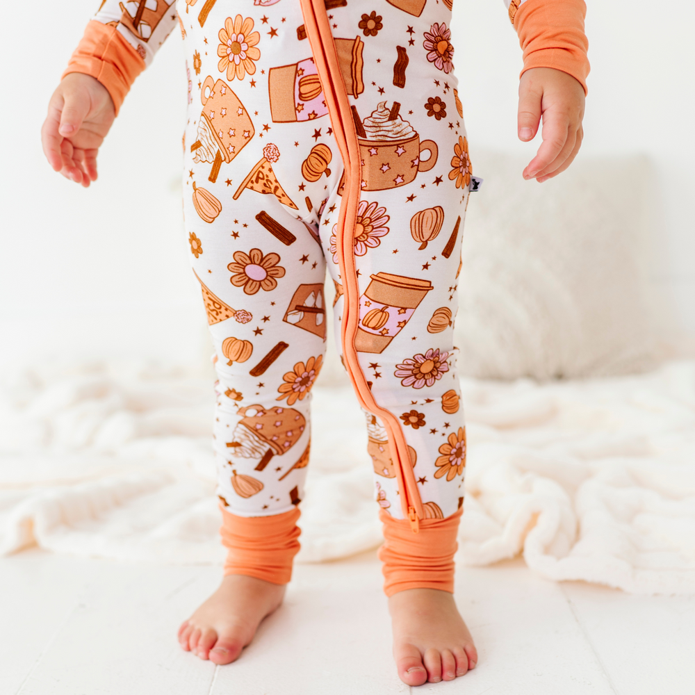 
                      
                        Baby in Pumpkin Spice Latte Pajamas by Kiki and Lulu
                      
                    