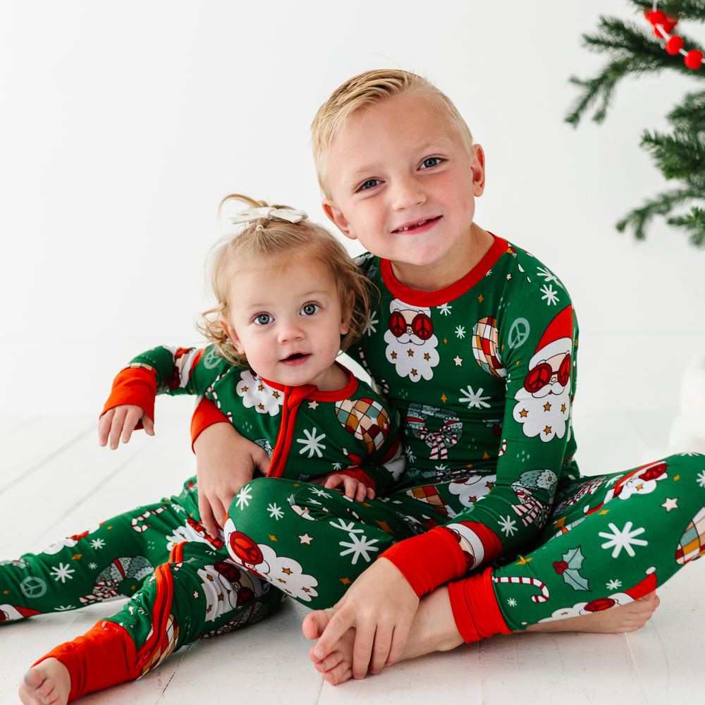 
                      
                        Siblings in retro Christmas  pajamas by Kiki and Lulu
                      
                    