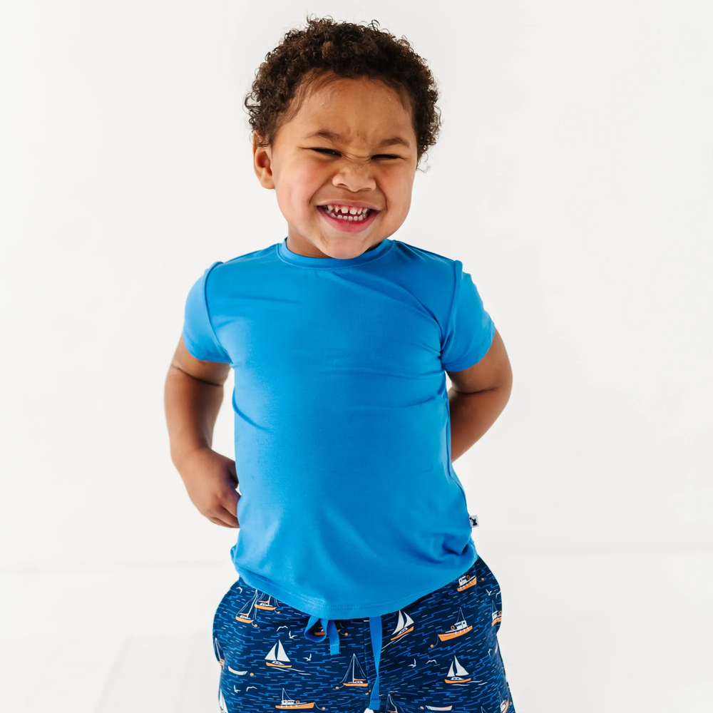 
                      
                        Boy in Sailboat shorts by Kiki and Lulu
                      
                    