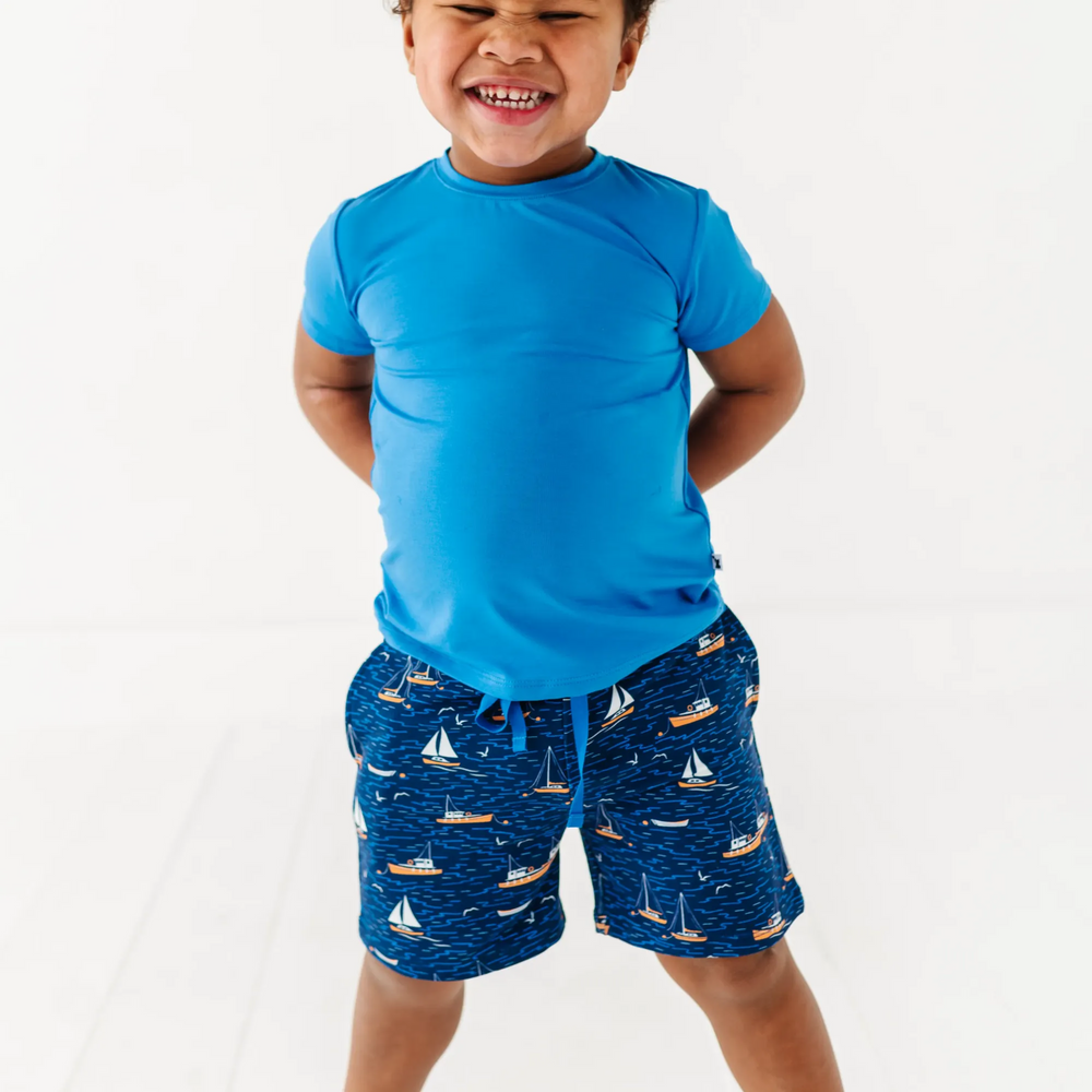 
                      
                        Boy in Sailboat shorts by Kiki and Lulu
                      
                    