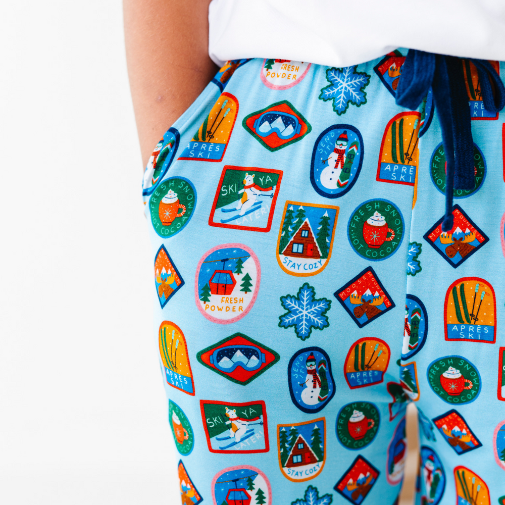 boy wearing ski pajama pants by Kiki and Lulu