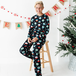 Boy in Kiki and Lulu Christmas Family Matching Snow Globe Pajamas